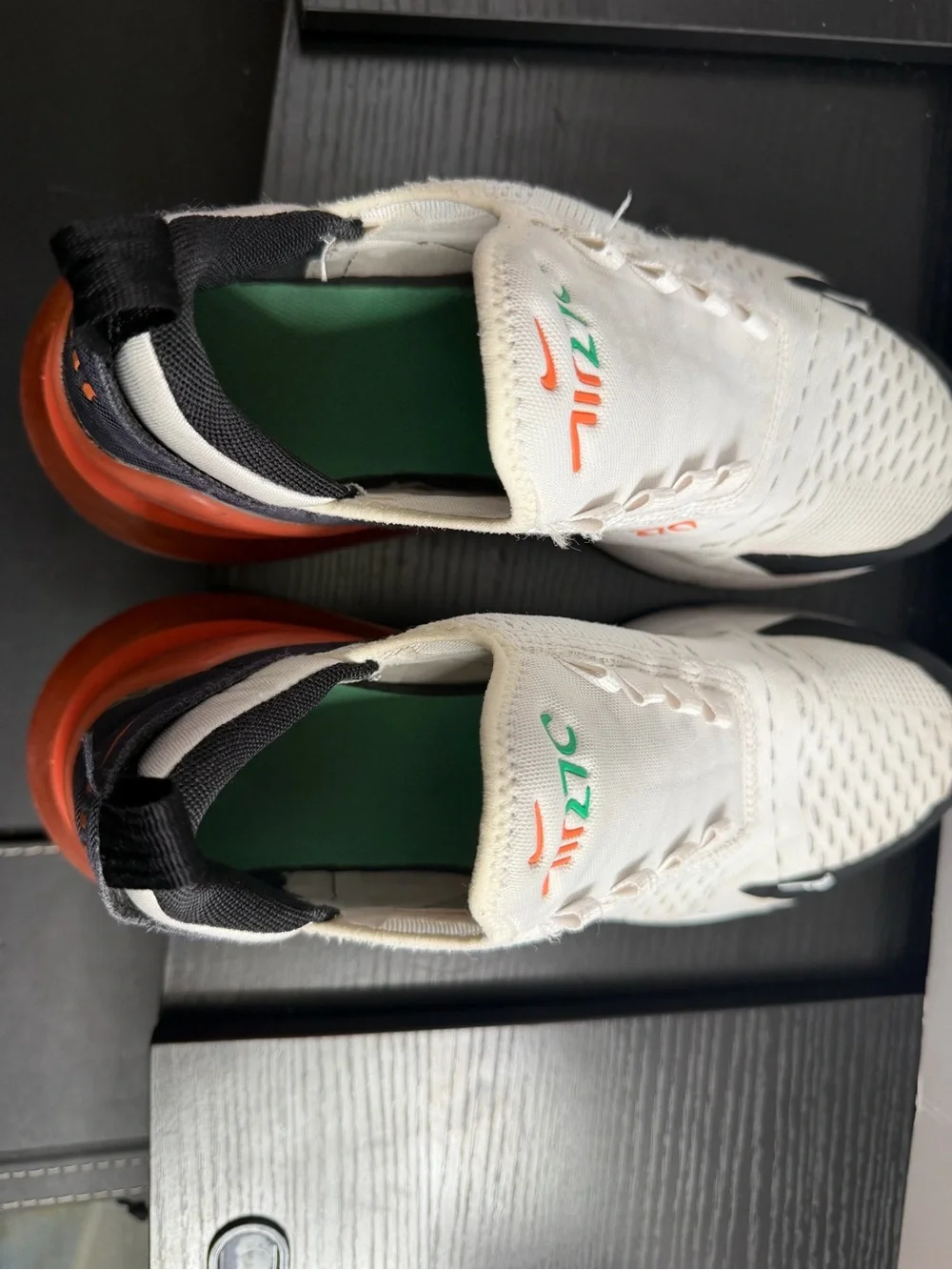 Nike Kids White Sneakers with Black, Orange and Green Accents